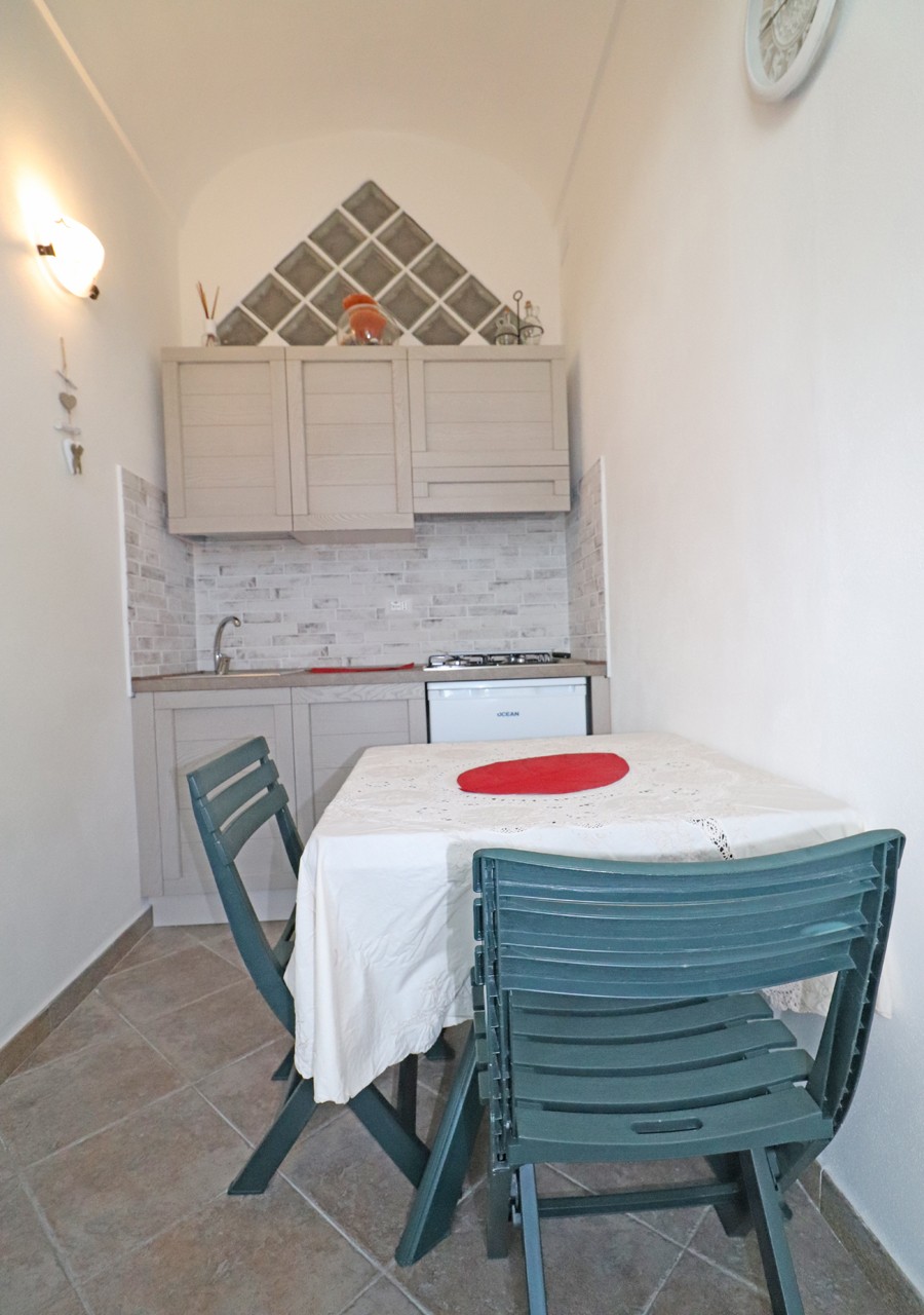 Mongiardino-monolocale-la-maddalena-immobiliare-murphy-angolo-cottura